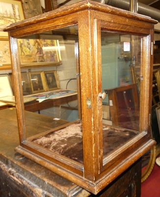 Lot 1274 - An early 20th century oak square table top...