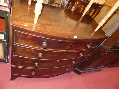 Lot 1275 - A Regency mahogany bow front chest of two...