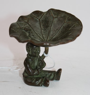 Lot 430 - A Chinese bronzed figure of a young boy...