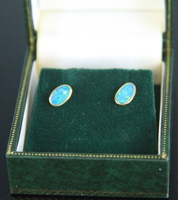 Lot 340 - A pair of yellow metal opal set ear studs, the...
