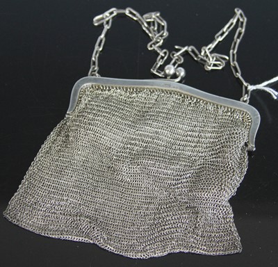 Lot 344 - A lady's silver meshlink evening bag, on chain,...
