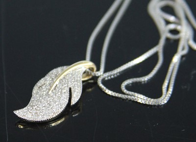 Lot 351 - A contemporary 9ct gold diamond point set leaf...