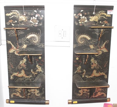 Lot 645 - A pair of Japanese black lacquered wall...