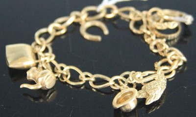 Lot 352 - A 9ct gold curblink bracelet, containing...