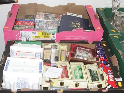 Lot 643 - Two boxes of diecast model vehicles and rugby...