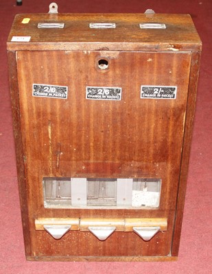 Lot 621 - A vintage wall-mounted cigarette dispenser, 52...