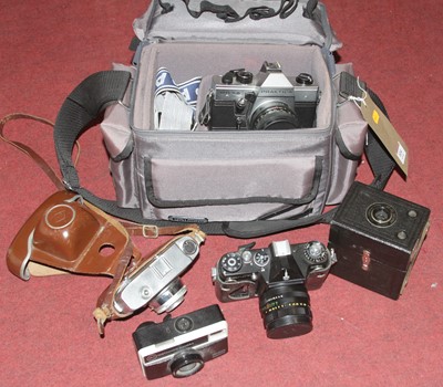 Lot 614 - A collection of vintage photography equipment,...