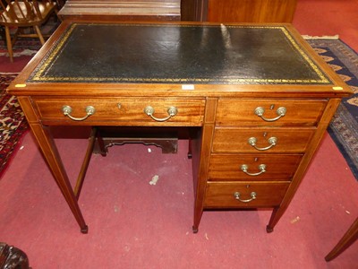 Lot 1278 - An Edwardian mahogany and gilt tooled leather...