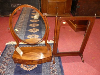 Lot 1279 - A circa 1900 mahogany oval swing box base...
