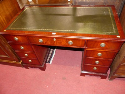 Lot 1285 - A reproduction mahogany and gilt tooled...