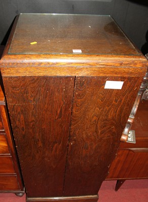 Lot 1292 - An early 20th century oak double door office...