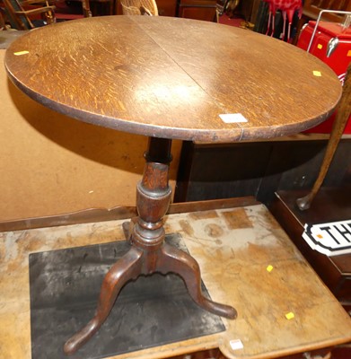 Lot 1298 - An early 19th century provincial oak circular...