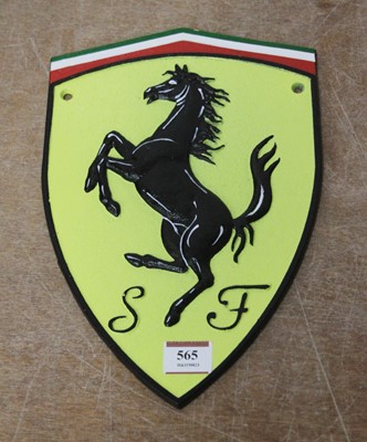 Lot 565 - A reproduction cast iron Ferrari badge, 30 x 20cm