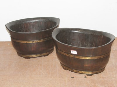 Lot 560 - A pair of brass coopered stained pine...