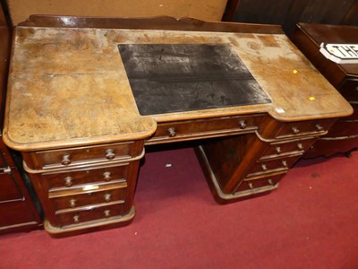 Lot 1299 - A mid Victorian figured walnut ledgeback round...