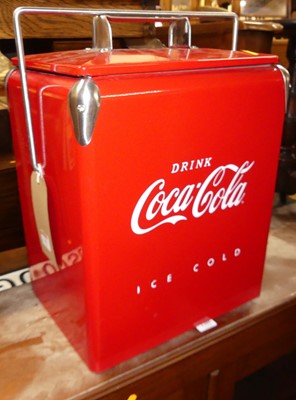 Lot 1304 - A contemporary red painted metal drinks...