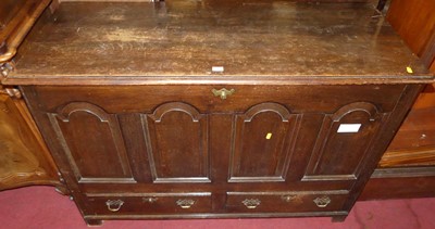 Lot 1310 - An 18th century joined oak four panelled hinge...
