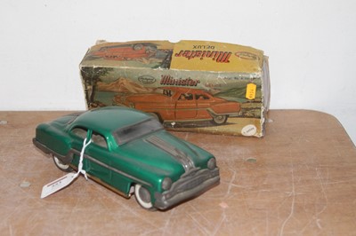Lot 553 - A vintage Minster Deluxe tin plated model car,...
