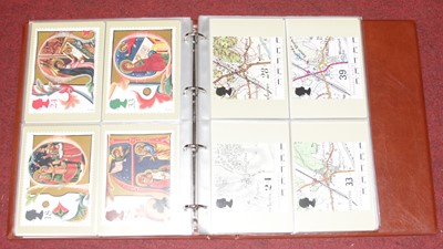 Lot 545 - Four albums of Royal Mail stamp postcards