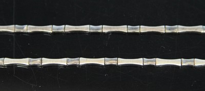 Lot 379 - A contemporary silver sectional necklace, 44cm;...