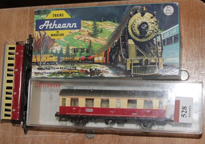 Lot 528 - Four model railway carriages, to include...