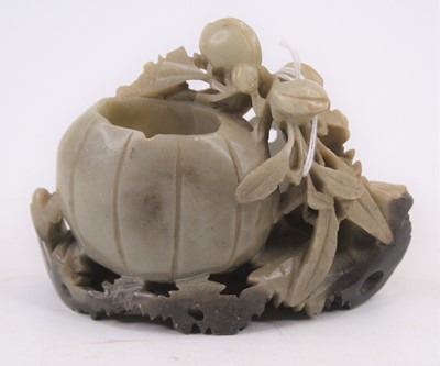 Lot 500 - A Chinese soapstone carving, height 8cm