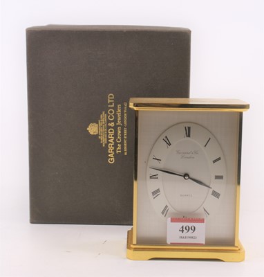 Lot 499 - A Garrard & Co. quartz brass cased mantel...