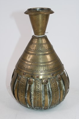 Lot 482 - A Middle-Eastern brass and coconut vase, h.21.5cm