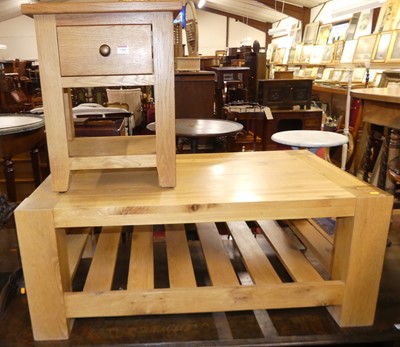 Lot 1366 - A contemporary light oak rectangular low...