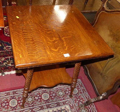 Lot 1371 - An early 20th century oak square two-tier...