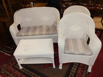 Lot 1383 - A contemporary white painted wicker four-piece...