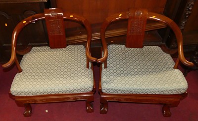 Lot 1392 - A pair of contemporary Chinese teak horseshoe...