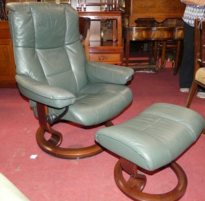 Lot 1402 - A contemporary Stressless green leather...