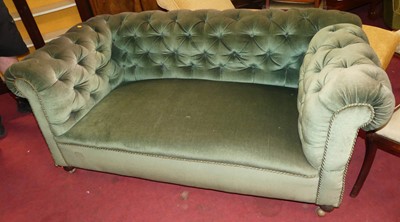 Lot 1405 - A circa 1900 green button back upholstered...