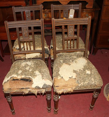 Lot 1407 - A set of four late Victorian oak dining chairs,...