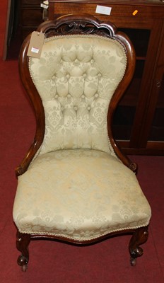 Lot 1411 - A mid Victorian walnut framed and floral silk...