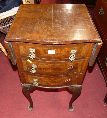 Lot 1414 - A figured walnut and cross banded drop flap...