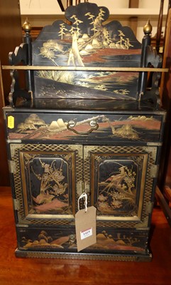 Lot 1419 - A Japanese black lacquered and gilt decorated...