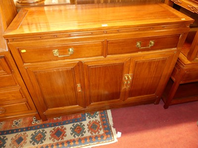 Lot 1426 - A contemporary Chinese hardwood sideboard,...