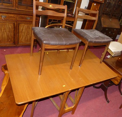 Lot 1482 - A set of four 1970s teak twin bar back dining...