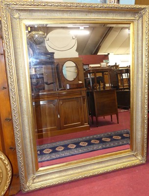 Lot 1074 - A reproduction gilt composition framed and...