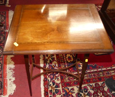 Lot 1438 - An Edwardian mahogany foldover card table,...