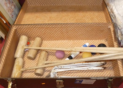 Lot 1079 - A metal bound trunk containing croquet set...