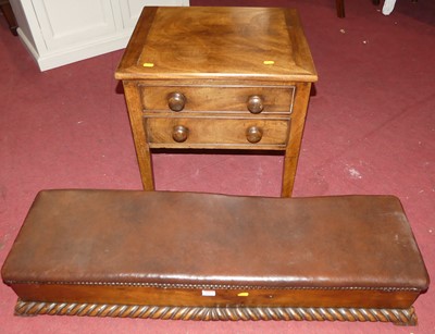 Lot 1457 - An elm long footstool, having a tan leather...