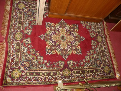 Lot 1206 - A Persian woollen red ground Tabriz rug, 158 x...