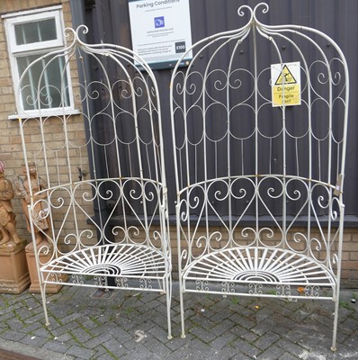 Lot 1511 - A pair of contemporary white painted scroll...