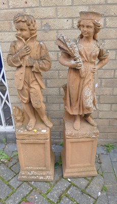 Lot 1512 - A pair of terracotta effect reconstituted...