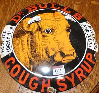Lot 1111 - A convex enamel advertising sign for Dr Bull's...