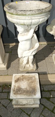 Lot 1522 - A reconstituted garden bird bath, the...