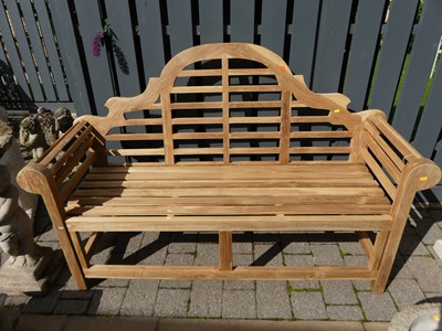Lot 1525 - A contemporary slatted teak Lutyens...
